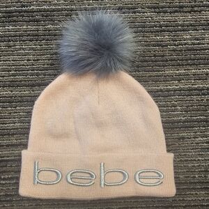 Bebe Beige Beanie with Fluffy Gray Pom-Pom